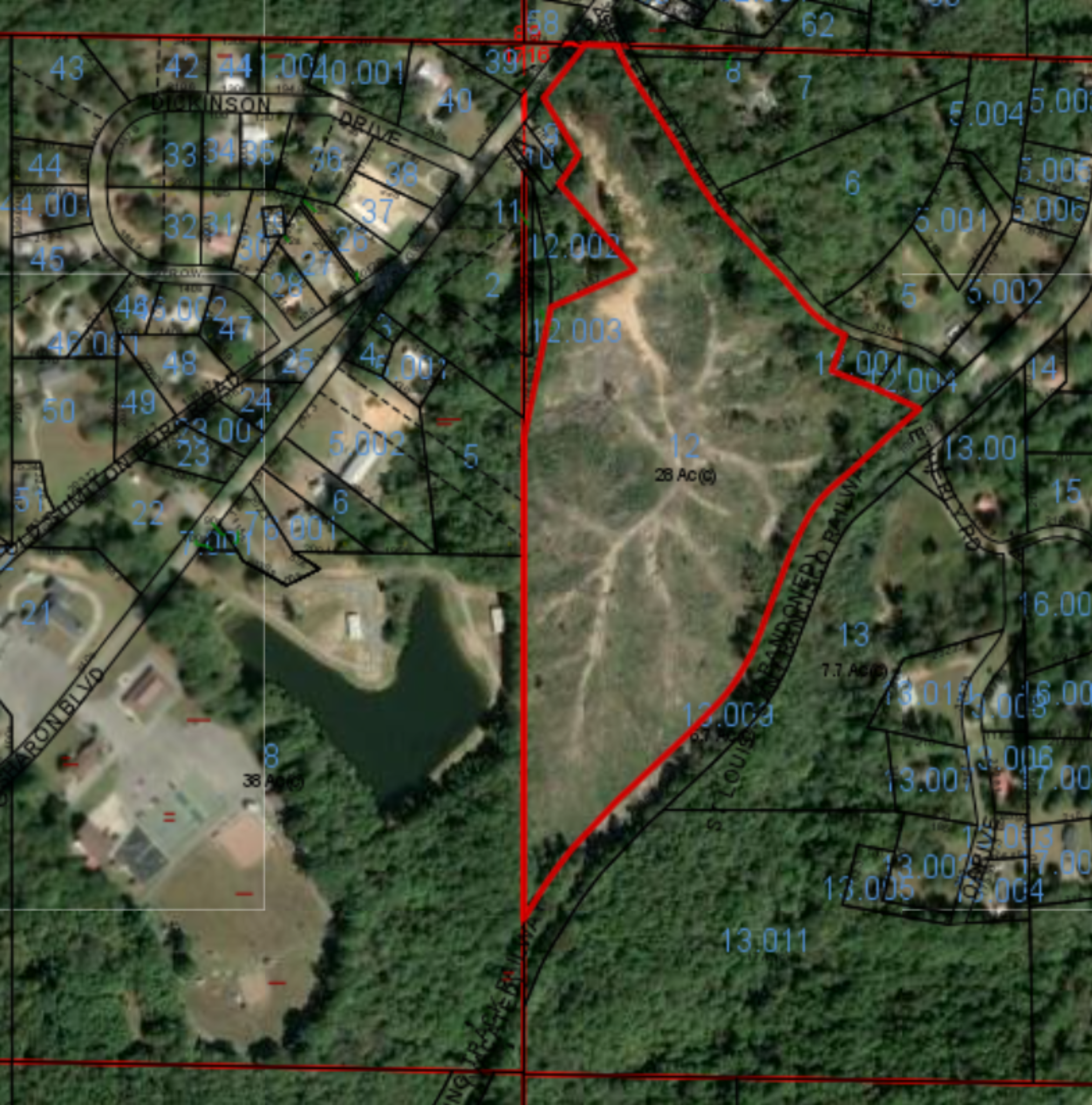 Aerial parcel map with parcel outline over satellite imagery